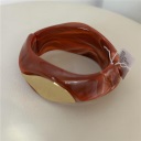 bracciale con dettaglio oro sul davanti shine